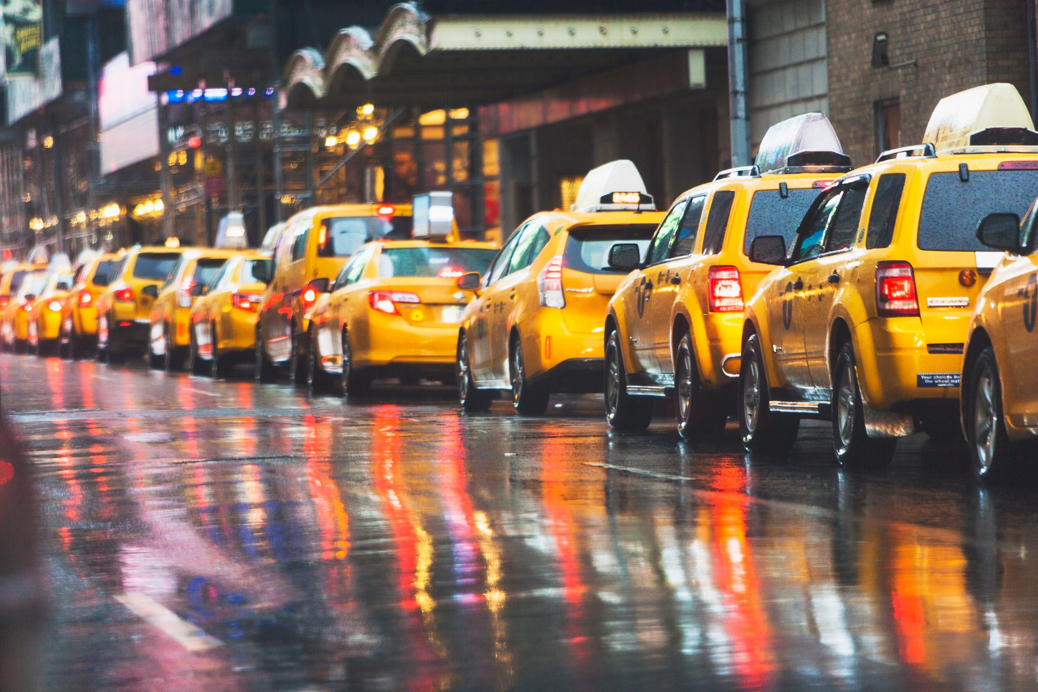 A row of taxis on the street