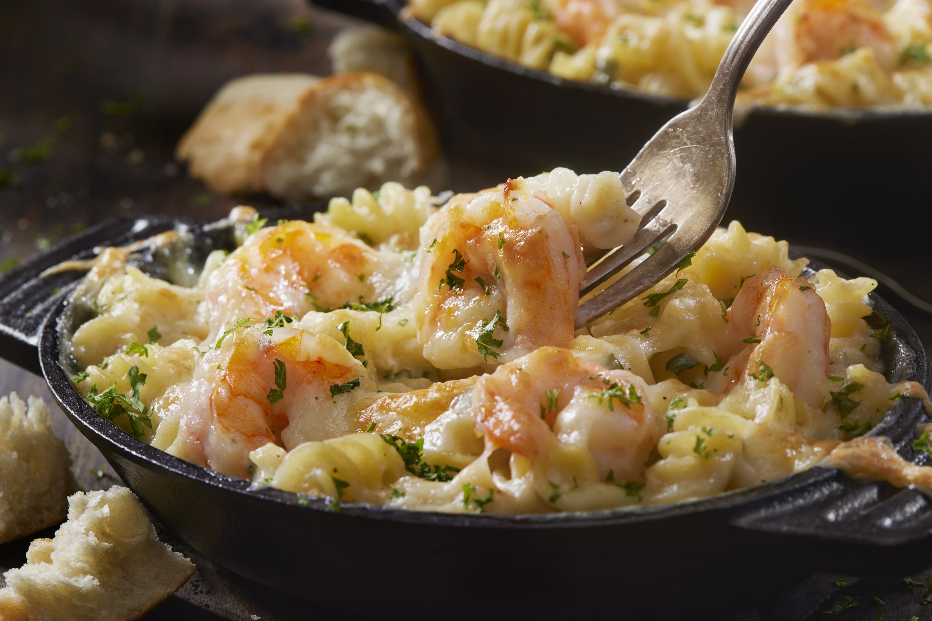 bowl of mac and cheese with shrimp