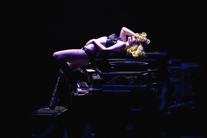 Lady Gaga performs on stage lying on top of a piano during her Monster Ball Tour at O2 Arena on May 31, 2010 in London, England.