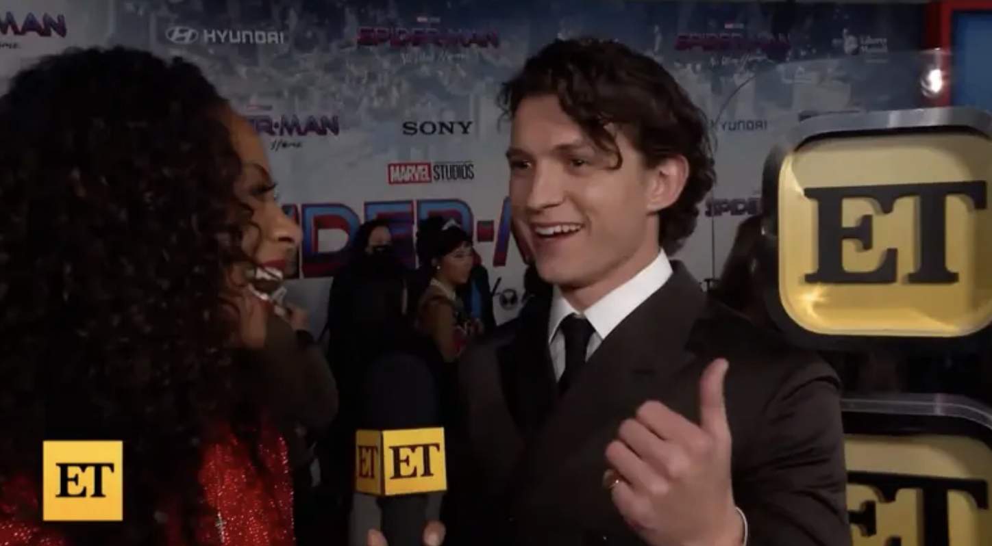 Tom talking to the interviewer
