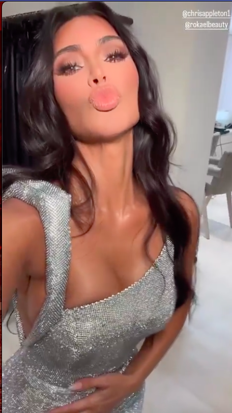 Kim giving kissy face to the camera