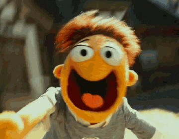 a gif of a muppet running fast