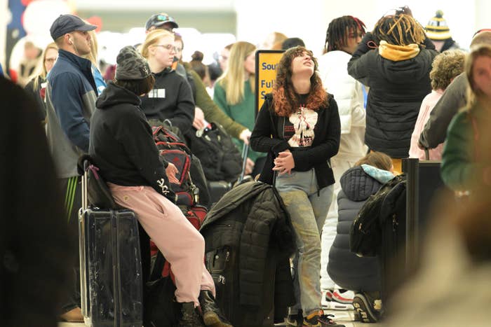 People waiting in line at Denver International Airport