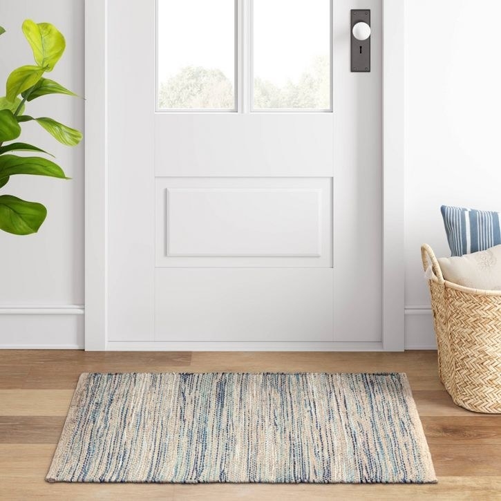 the indigo rug in an entryway