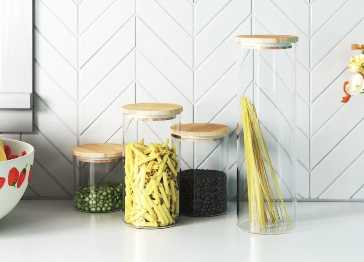 the four transparent food canisters