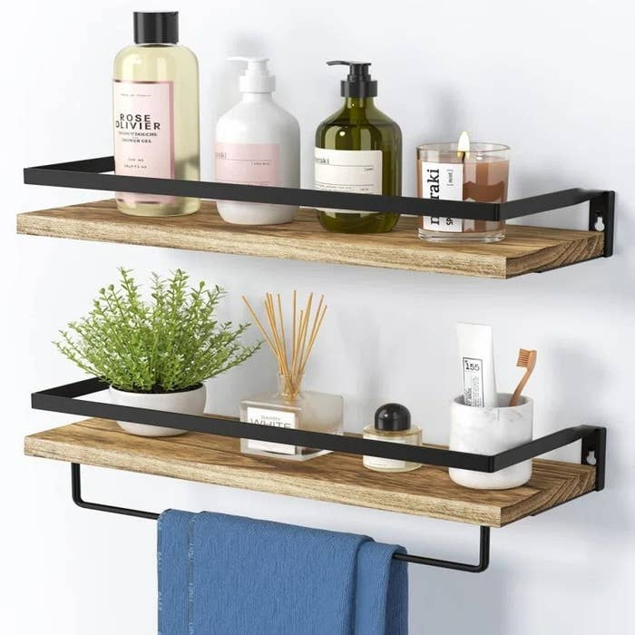 Shelves holding bathroom decor