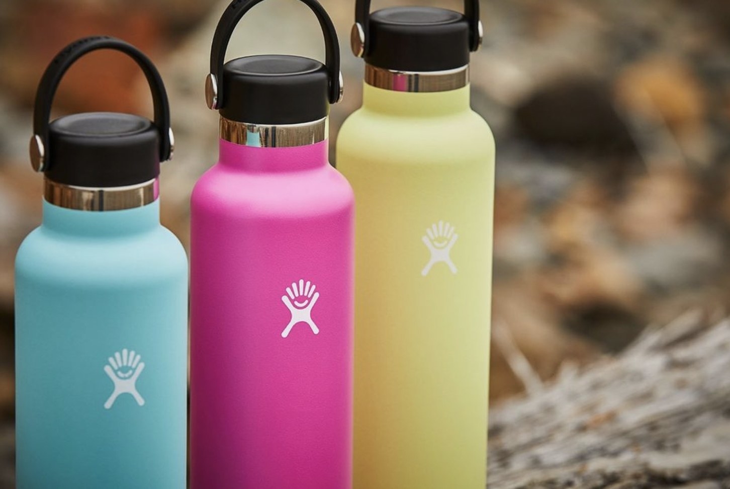 the blue, pink, and yellow waterbottles