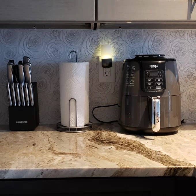 reviewer photo of ninja air fryer on a counter