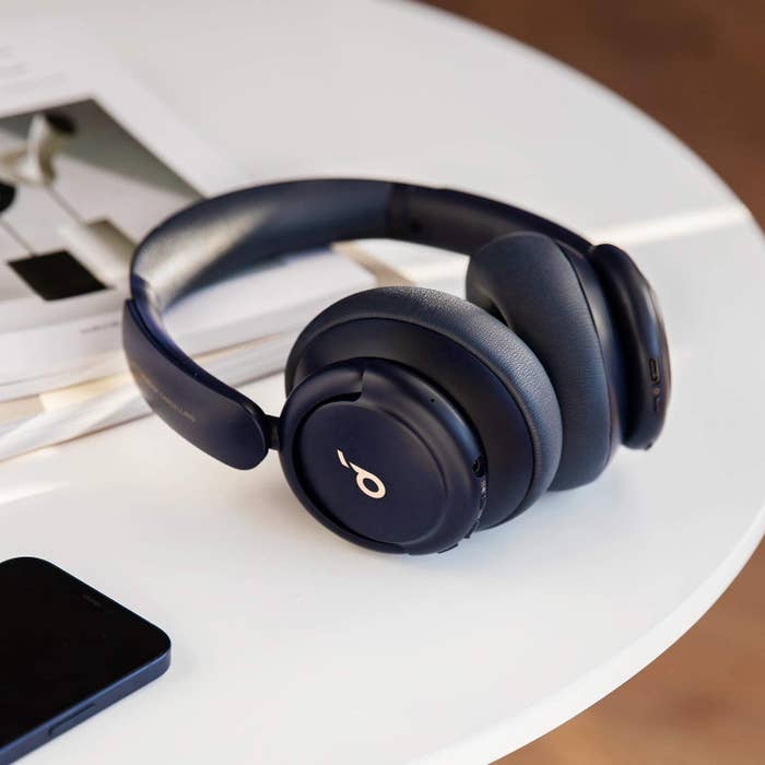 A set of wireless headphones on a table
