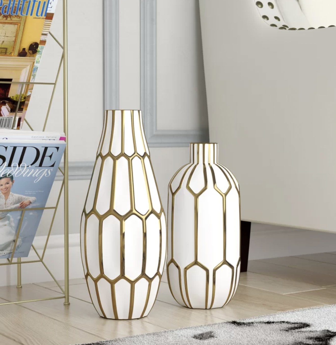 two white and gold vases