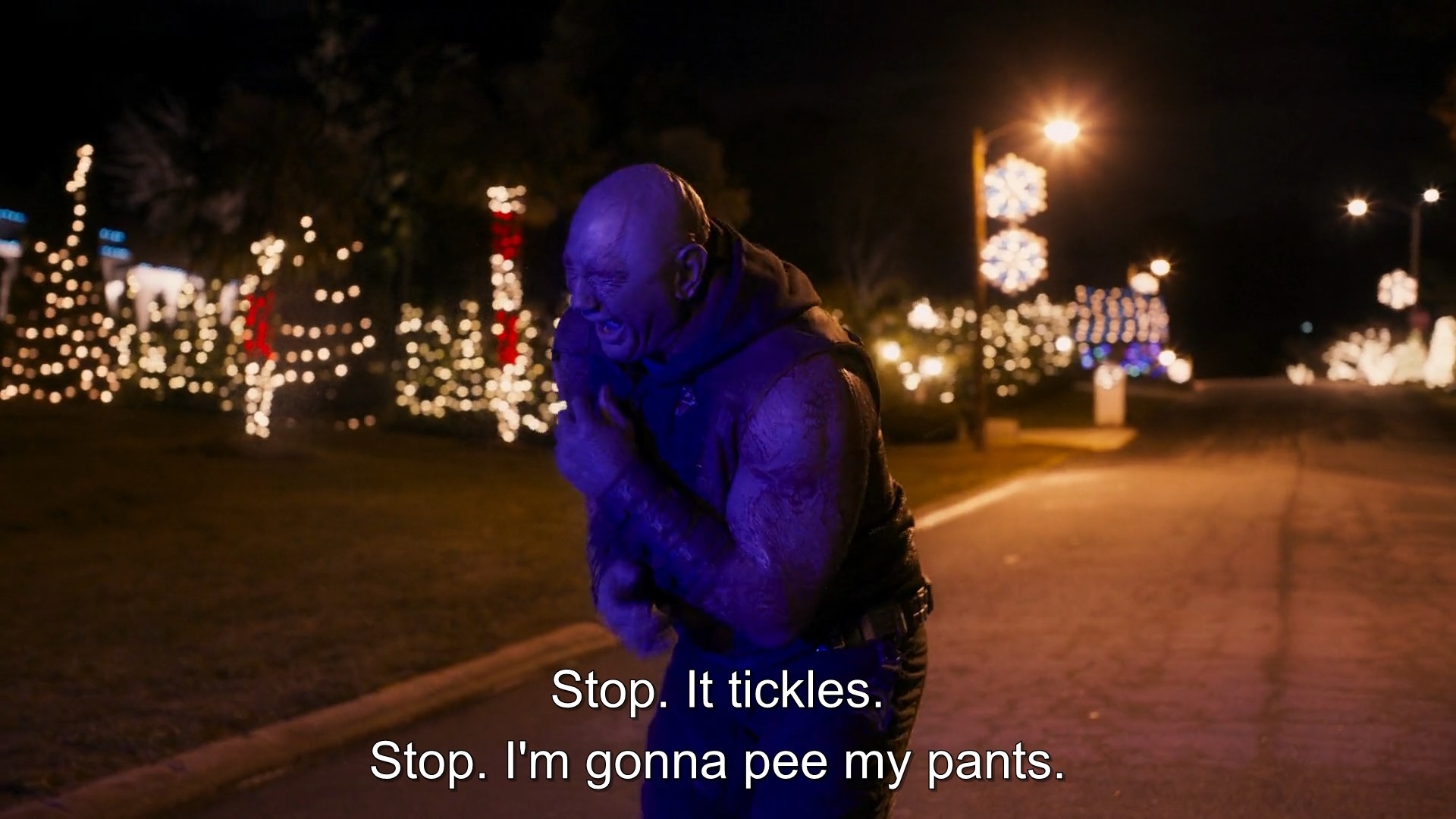 Drax laughs as bullets hit him