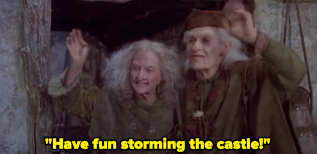 A woman and a man waving, shouting &quot;Have fun storming the castle!&quot;