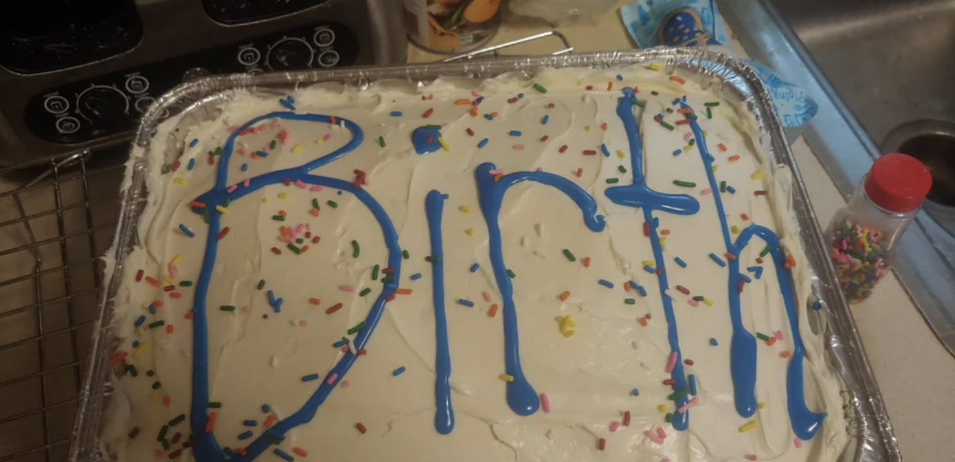a cake that says &quot;birth&quot; on it