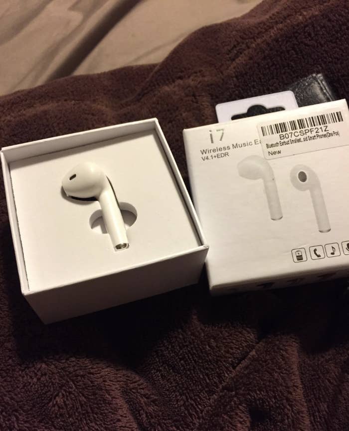 A product box showing two earbuds but containing only one