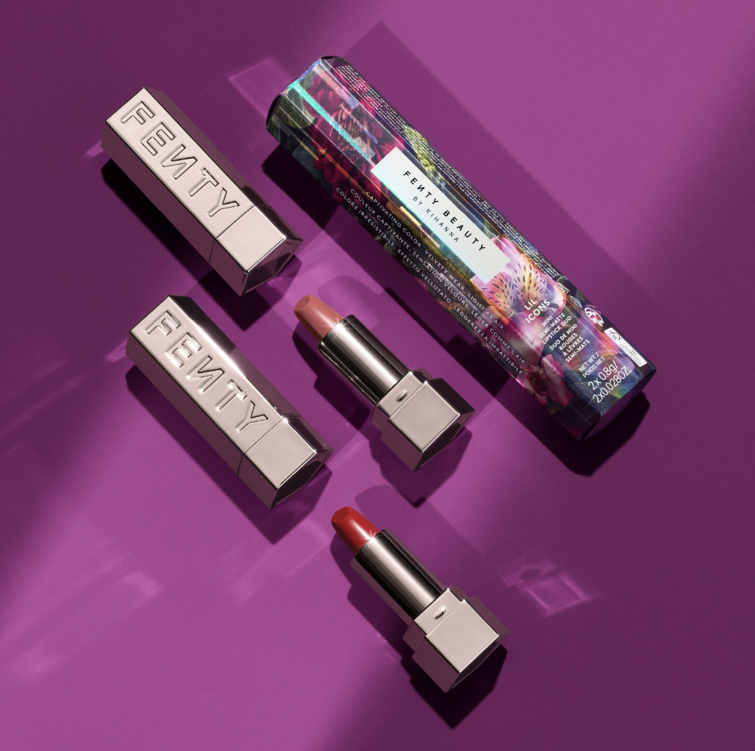 The two lipsticks next to their box