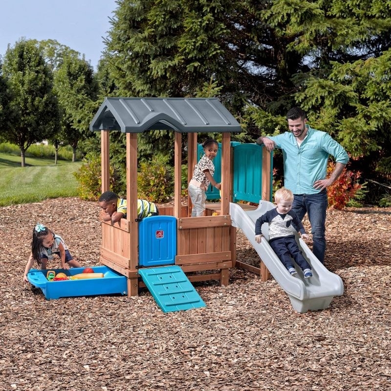 kids with playhouse