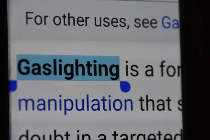 A close-up of a computer screen with the word &quot;gaslighting&quot; highlighted