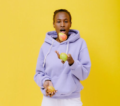 A young woman juggling