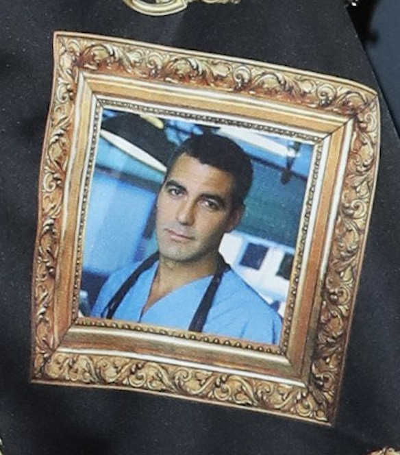 George wearing scrubs in a promotional photo for ER