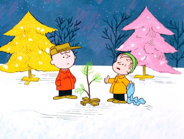 Charlie Brown and Linus looking at a sad Christmas tree.