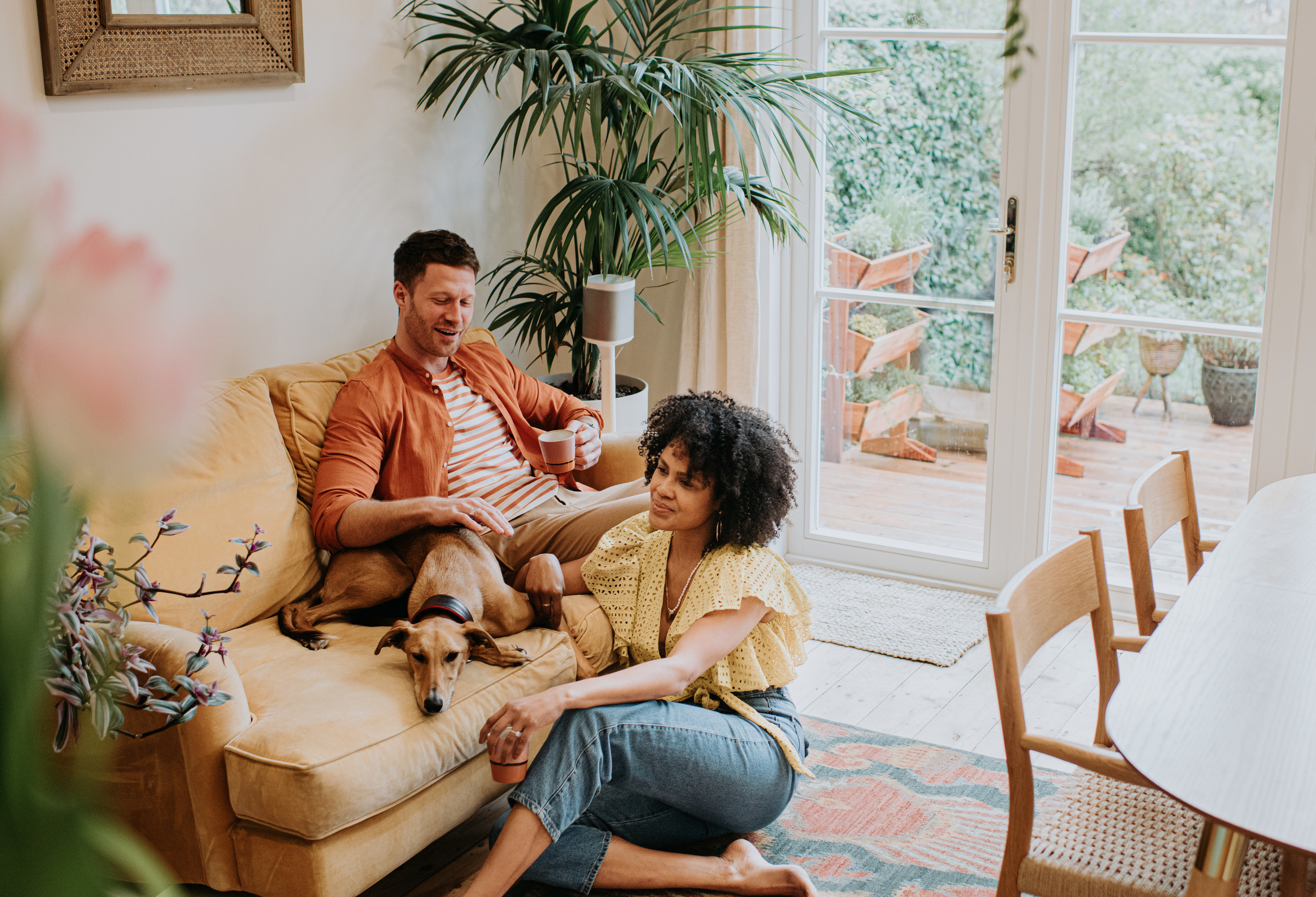 Couple sitting in their living room