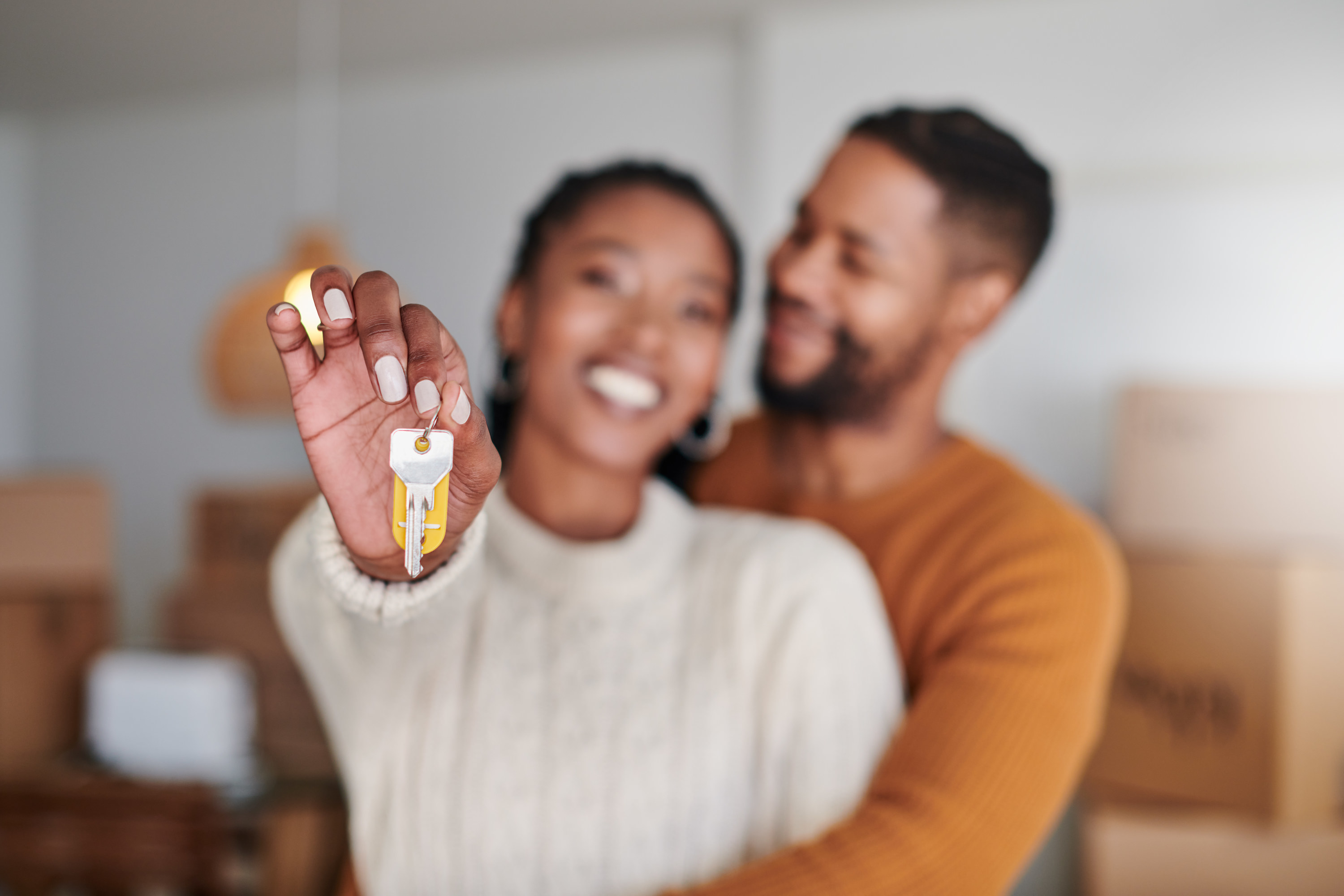 Couple holds the keys to their house