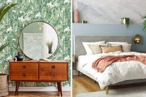 on left, leaf-print wallpaper behind wood dresser with circular mirror. on right, gray velvet headboard on bed with cozy bedding