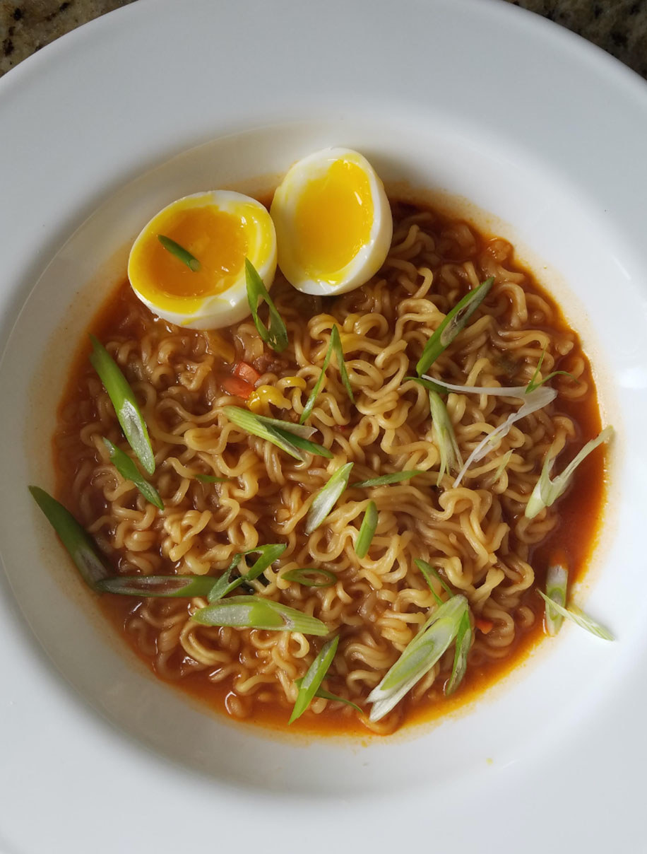 A bowl of ramen with eggs.