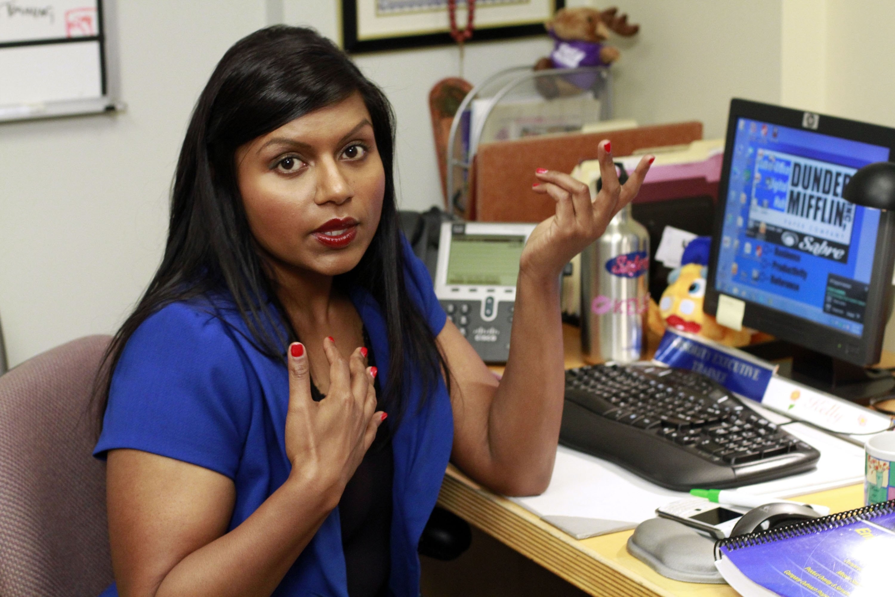 A closeup of Mindy&#x27;s character Kelly at a computer