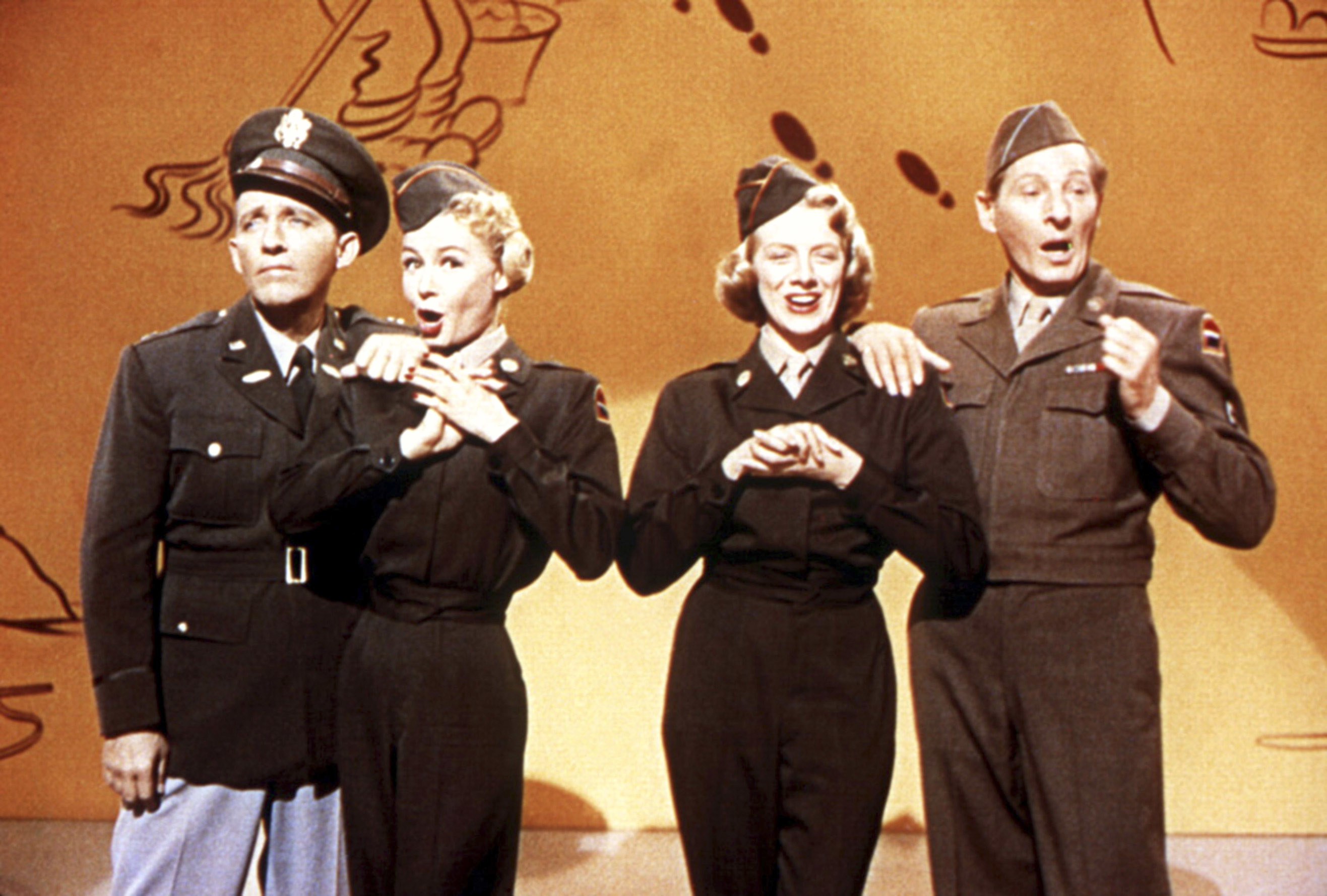 Bing Crosby, Vera-Ellen、迷迭香克鲁尼和丹尼·凯唱歌。