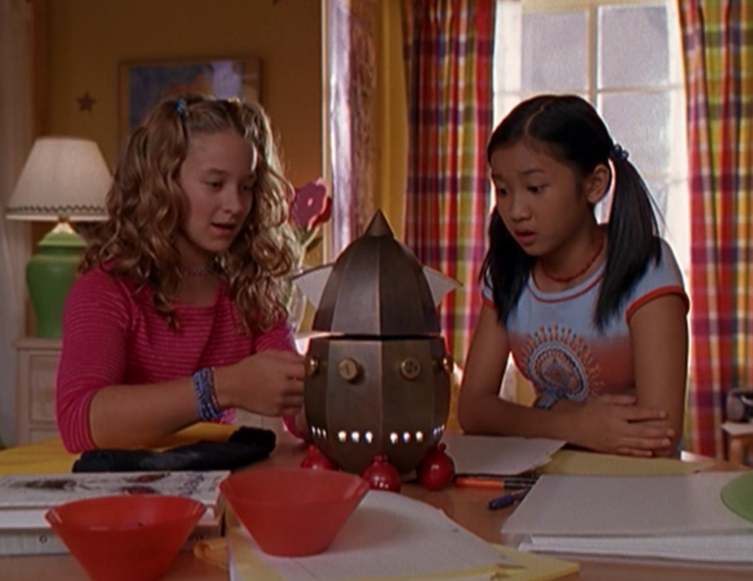 Hallee Hirsh as Allie and Brenda Song as Sam test out a weather machine in &quot;The Ultimate Christmas Present&quot;