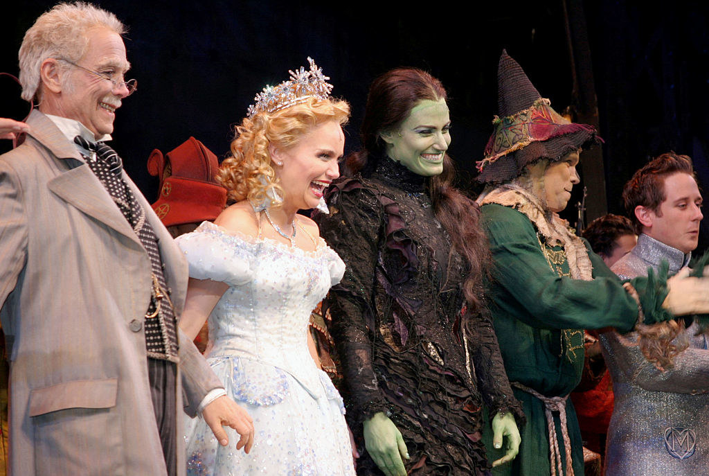 the cast of Wicked onstage