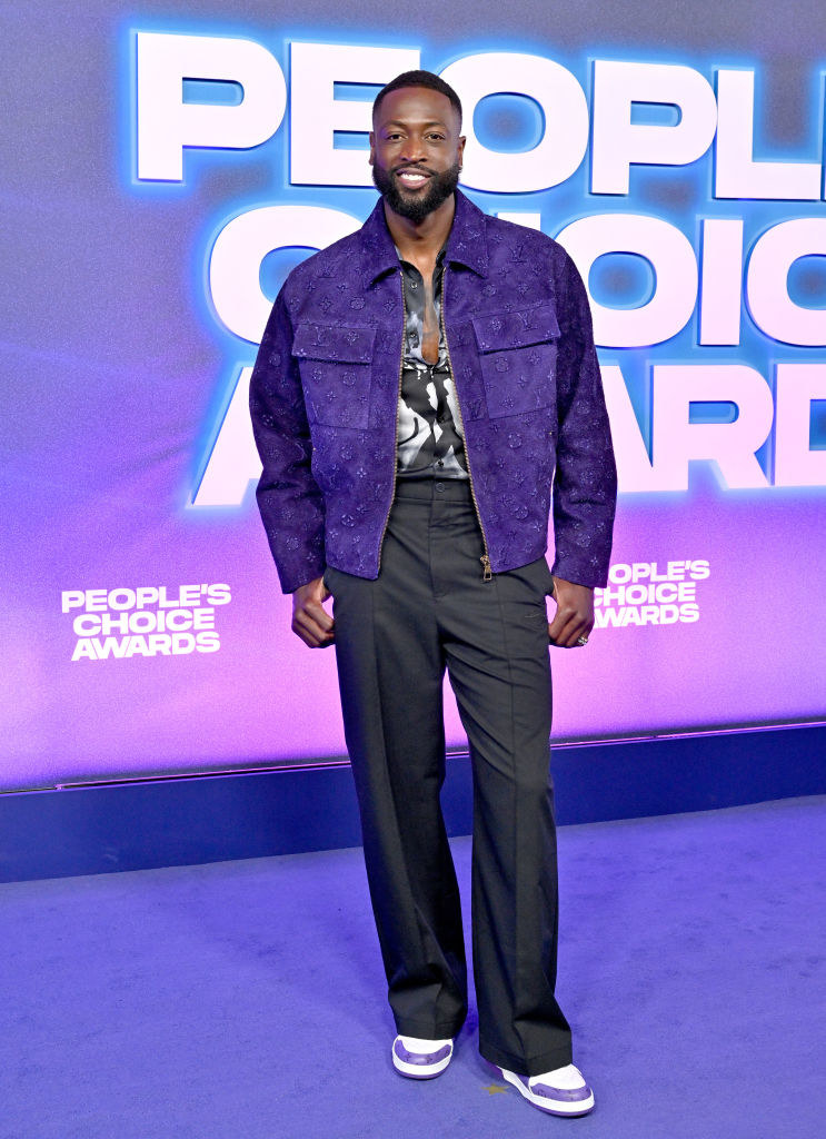 Dwyane Wade attends the 2022 People&#x27;s Choice Awards in slacks and a jacket