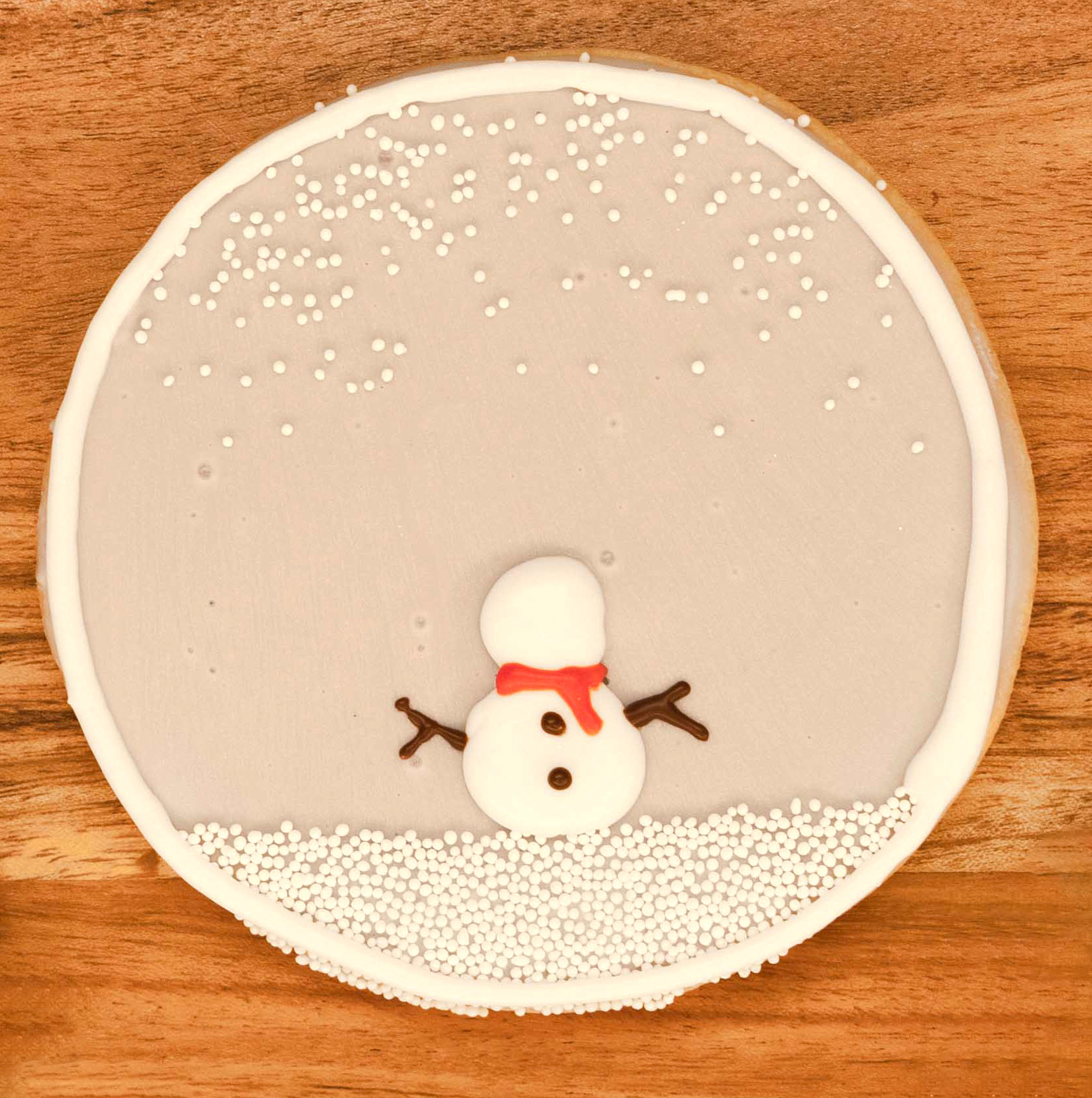 Snowman in the snow globe cookie