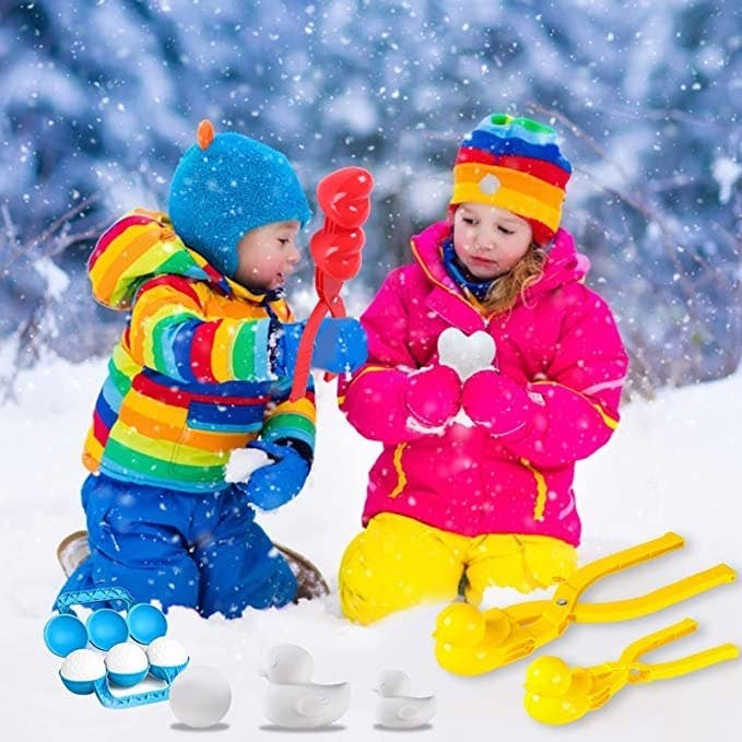Two kids playing in the snow