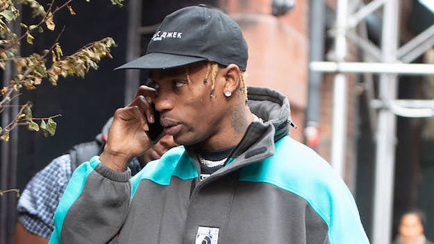 Travis Scott seemingly denies rumors (and a picture) that allege he's cheating.