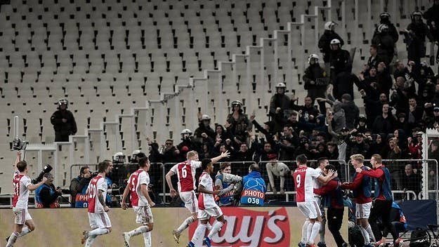 The chaos erupted just moments before the soccer match between Amsterdam's Ajax and Greece's AEK Athens.