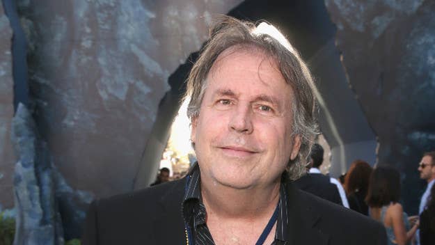 Terry Rossio, Oscar-nominated screenwriter of 'Shrek' and 'Aladdin,' was attacked on Twitter for including the n-word in a tweet about vaccines.