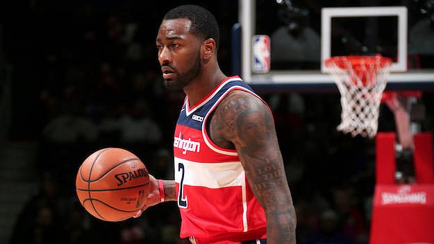 John Wall's fine for cursing at Wizards head coach Scott Brooks speaks to a bigger problem happening with their organization.