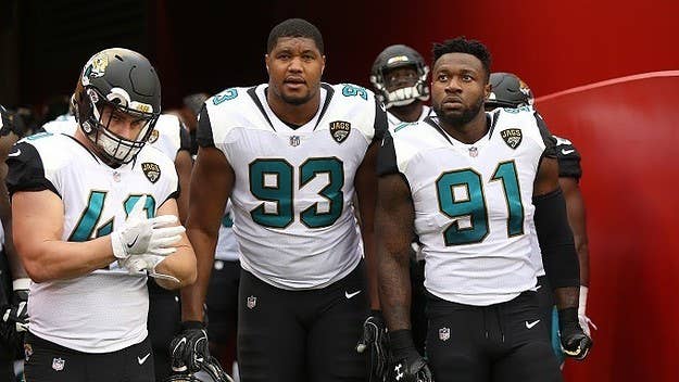 Yannick Ngakoue had to be restrained by his teammates following Jacksonville's loss to Houston. 