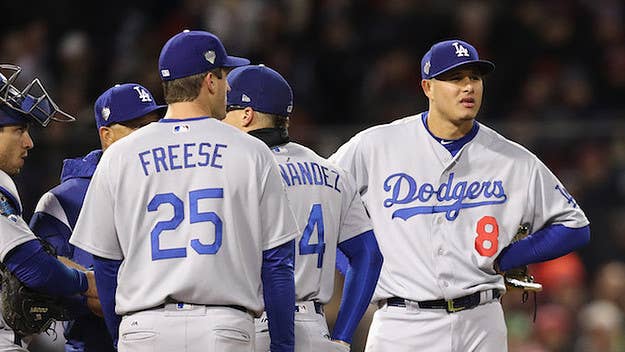 Boston's hitting coach said he saw Dodgers shortstop Manny Machado stealing the catchers' sign before Yasiel Puig knocked him in for a run in Game 2.