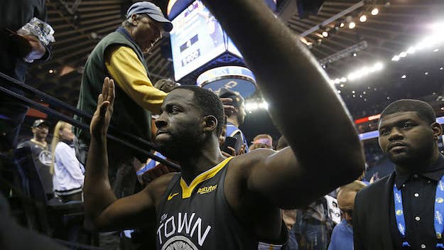 Draymond Green claims he's thinking about winning the Defensive Player of the Year award for last season's second-team snub. But it's probably aboiut the money.