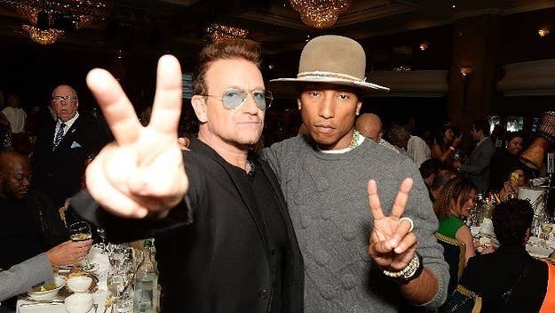 Pharrell and U2's Bono link up for a rework of the Bee Gees classic "Stayin' Alive."