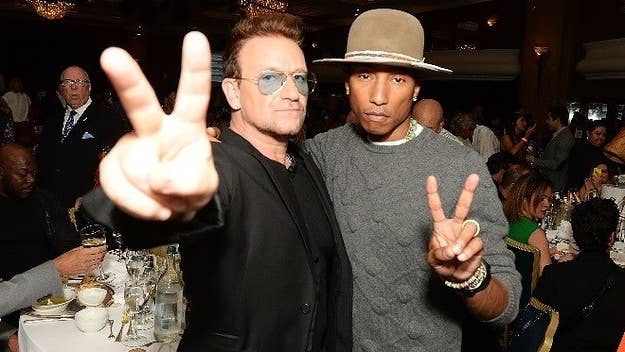 Pharrell and U2's Bono link up for a rework of the Bee Gees classic "Stayin' Alive."