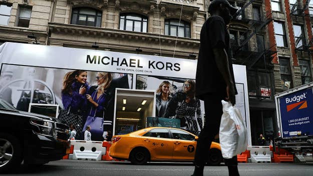 Michael Kors is dropping over $2 billion to buy Versace, following last year's bagging of Jimmy Choo.