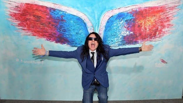 Tommy Wiseau and 'The Room' collaborator Greg Sestero re-enact the violent interrogation scene from 'The Dark Knight' to promote their new film.