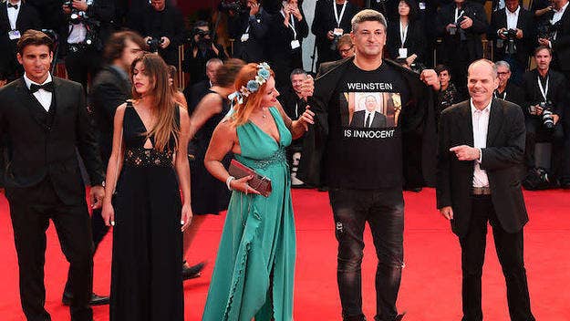 Italian filmmaker Luciano Silighini Garagnani wore the homemade t-shirt on the red carpet for Luca Guadagnino's 'Suspiria.' It read "Weinstein Is Innocent" under a photo of the disgraced producer. 