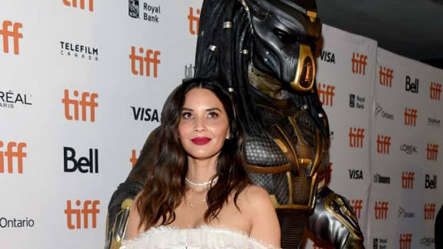 After Olivia Munn brought Steven Wilder Striegel's registered sex offender's past to the light, she says she will still promote 'The Predator.' The actress had a small scene with Streigel that has since been cut from the film.