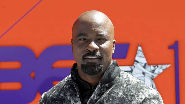 Mike Colter faced widespread criticism after he tweeted a joke about Ariana Grande getting groped on stage by Bishop Charles H. Ellis III. "Now THIS is how you shoot your shot!" read the tweet which Colter says was supposed to be sarcasm.