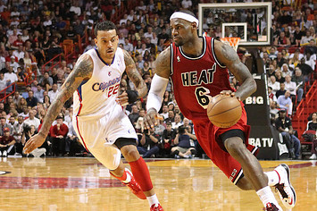 The Miami Heat's LeBron James drives against the Los Angeles Clippers' Matt Barnes.